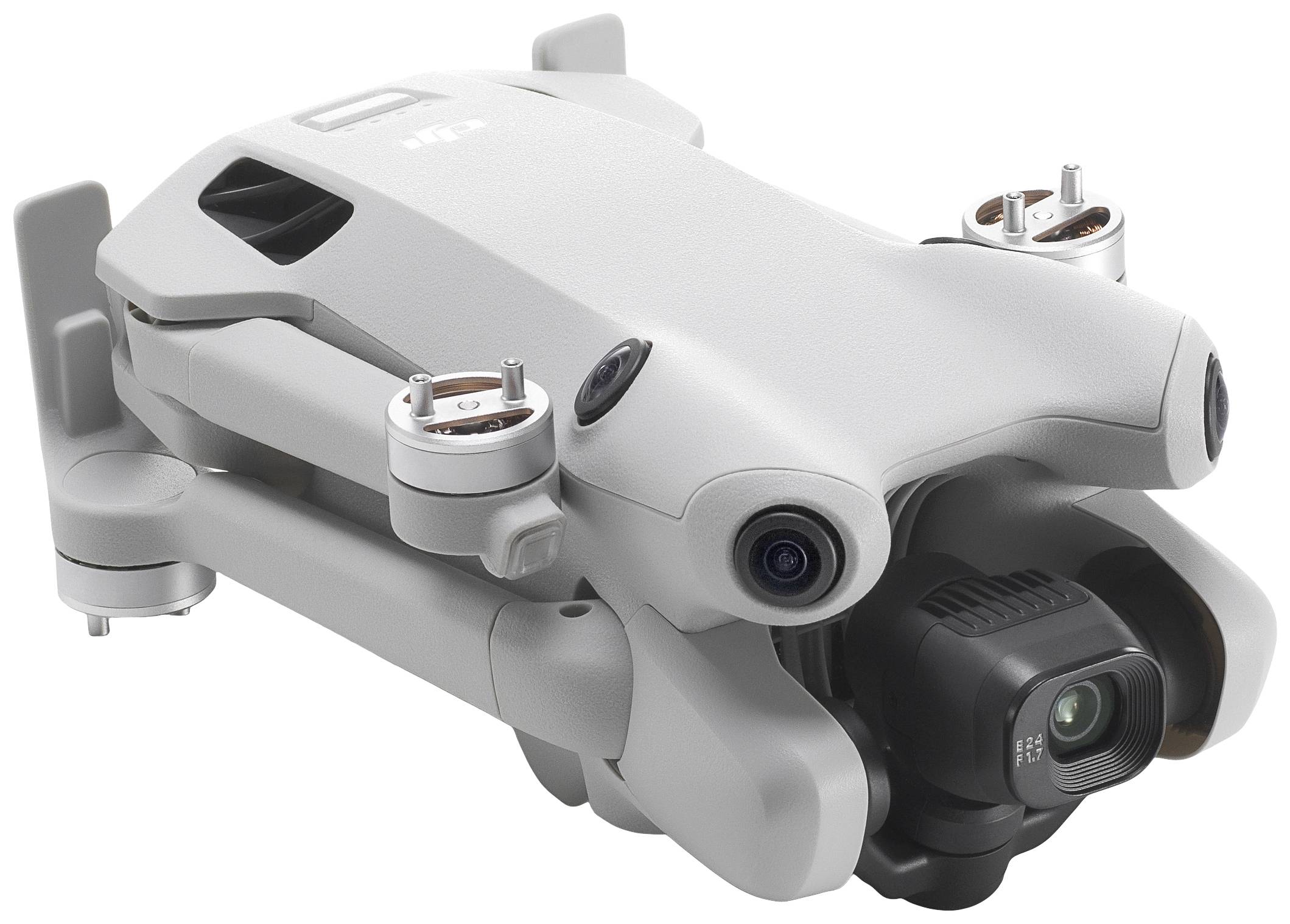 Kompaktní, šedý dron se čtyřmi vrtulemi a kamerou vpředu; složený pro snadnou přepravu.