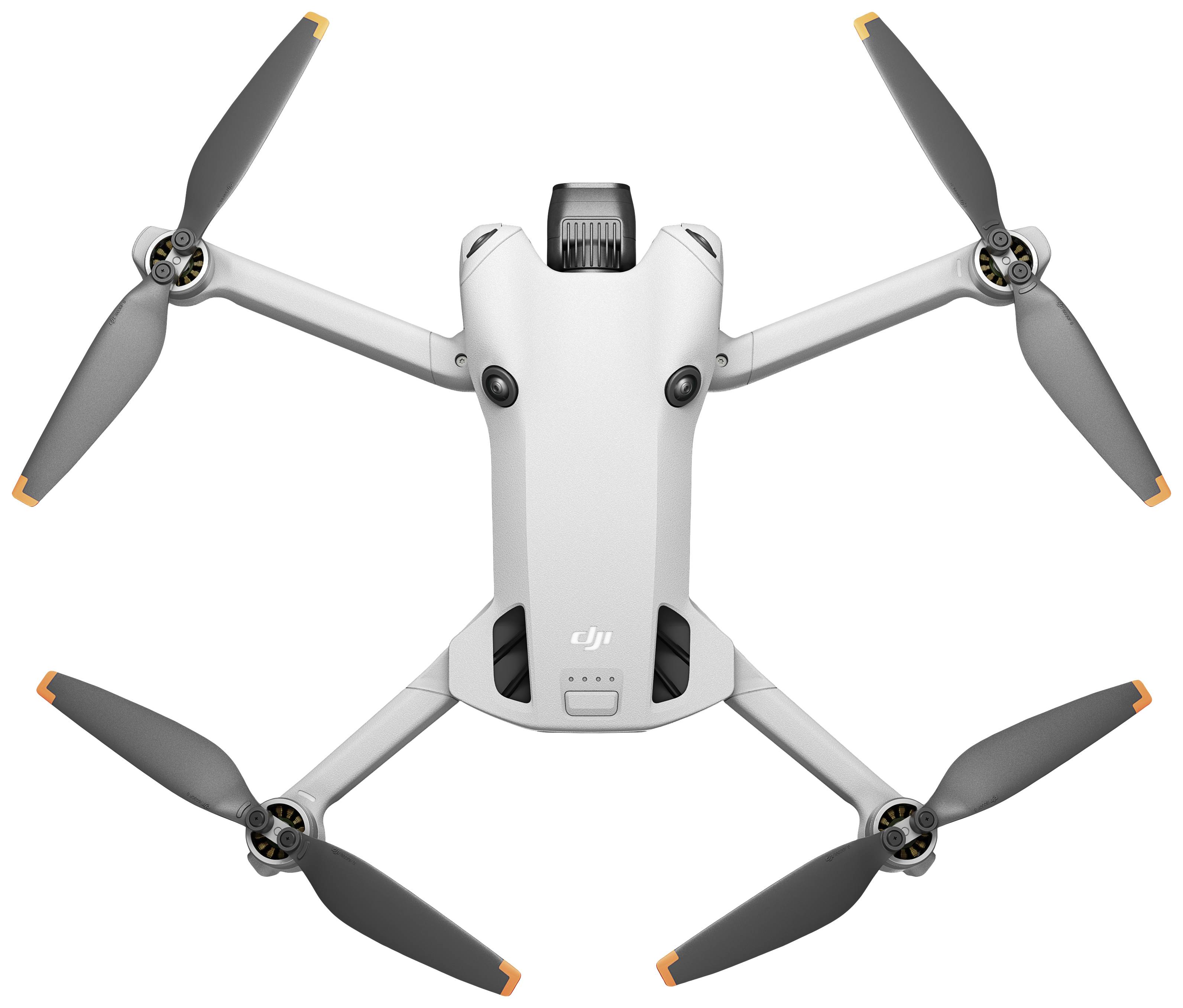 Bílý dron se čtyřmi rotory v konfiguraci X.