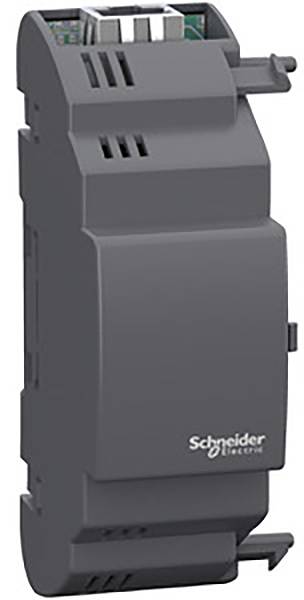 Šedý elektronický modul od Schneider Electric, úzký a obdélníkový s větracími štěrbinami a přípojkami nahoře.