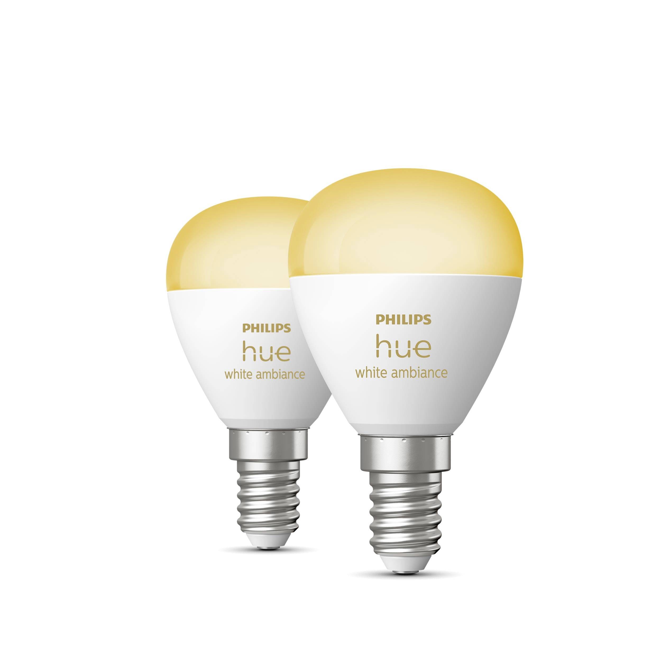 Dvě žárovky Philips Hue White Ambiance v bílé a oranžové barvě. Vhodné pro navozování nálady při osvětlení.