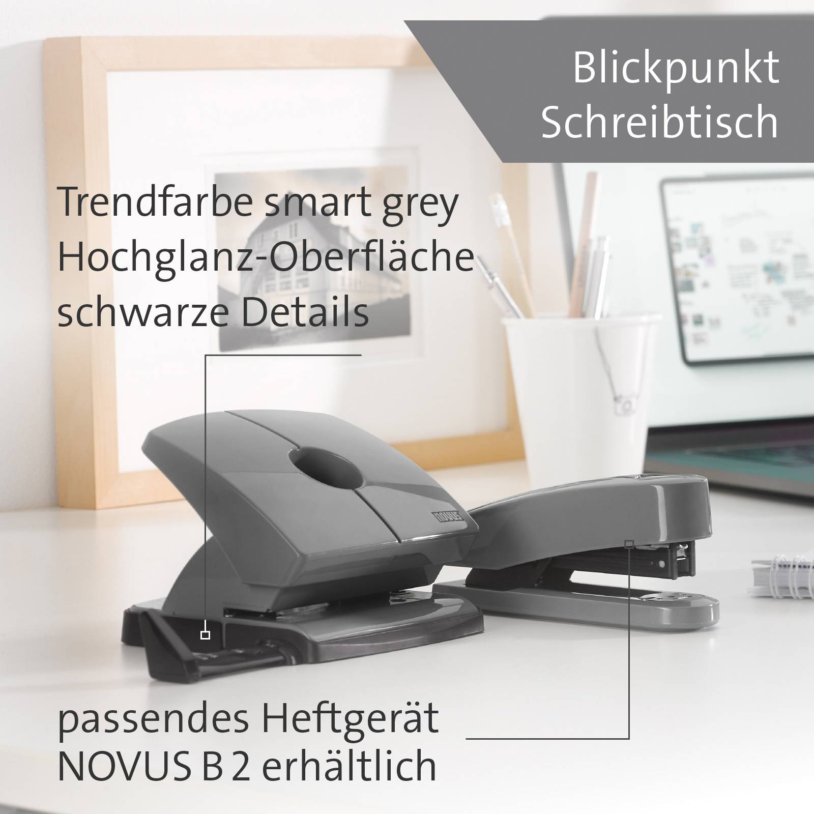 Módní barva smart grey: Vysoce lesklý povrch, černé detaily. K dispozici odpovídající kancelářská sešívačka. V pozadí kancelářské příslušenství.