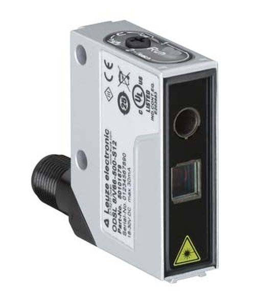 Obdélníkový optoelektronický senzor se žlutým laserovým symbolem a černým konektorem na straně, vhodný pro detekci objektů.