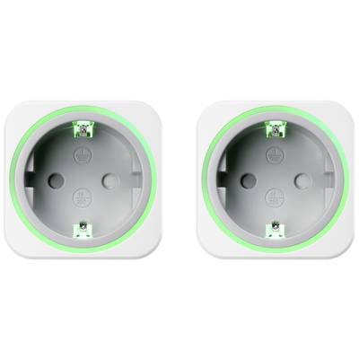 Dva prázdné elektrické výstupy se zeleným svítícím prstencem, umístěné vedle sebe.