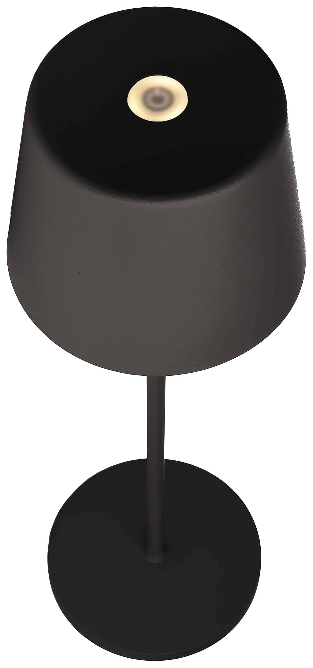 Černá, moderní stolní lampa s tenkým stojánkem a kruhovým podstavcem. Malý světelný kruh se rozsvěcuje nahoře na stínítku lampy.