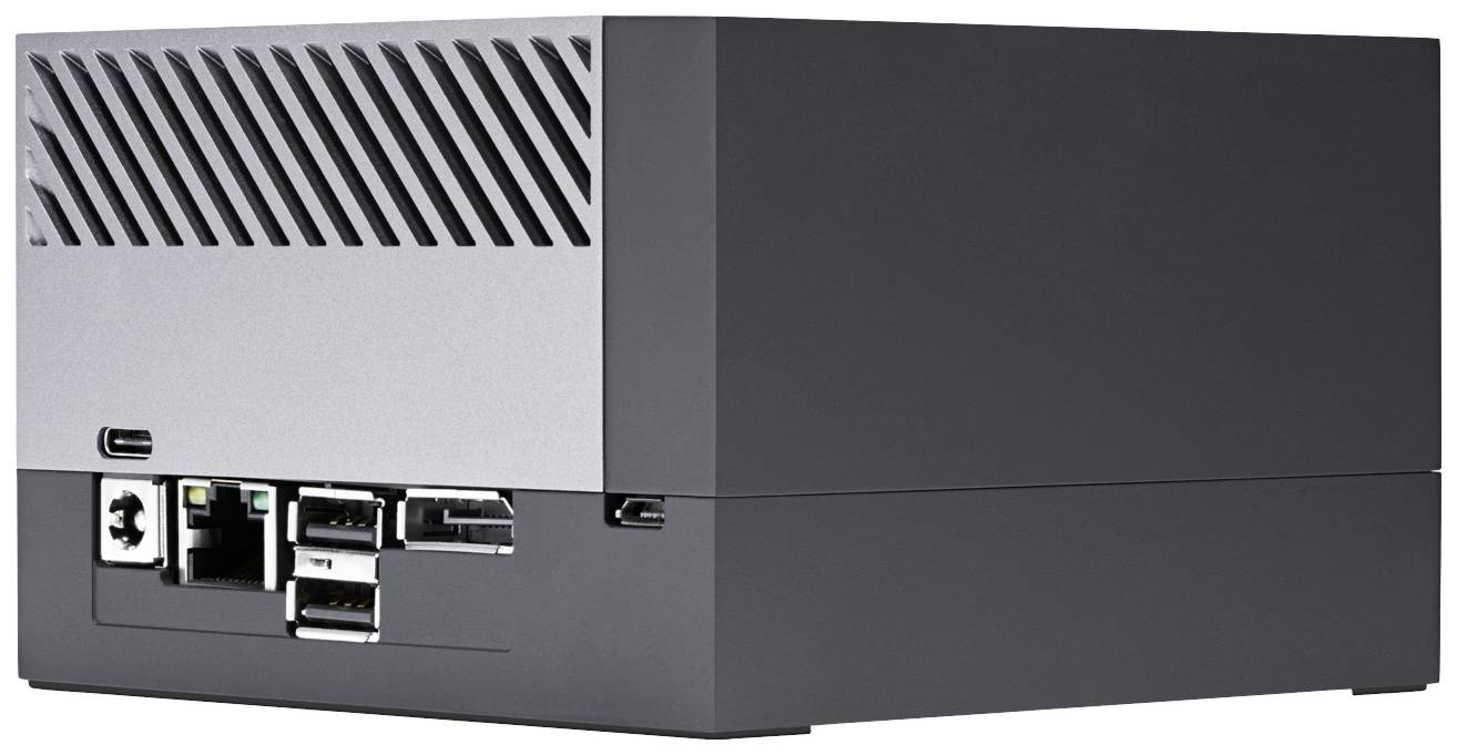 Malý, obdélníkový počítač s USB porty a větracími otvory na horní straně, vhodný pro IT aplikace.