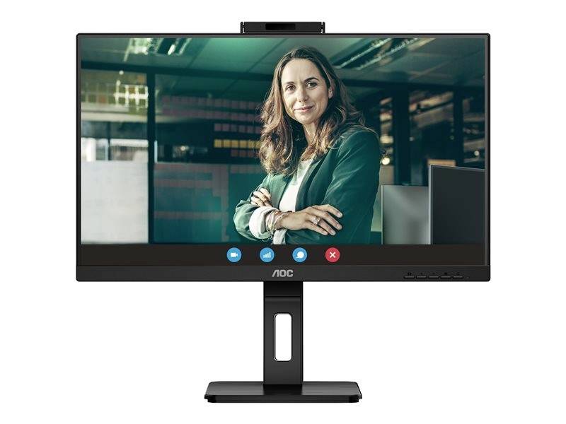 Žena na monitoru ve virtuální schůzce. Usmívá se a má na sobě zelené sako. Viditelné ikony mikrofonu a kamery.