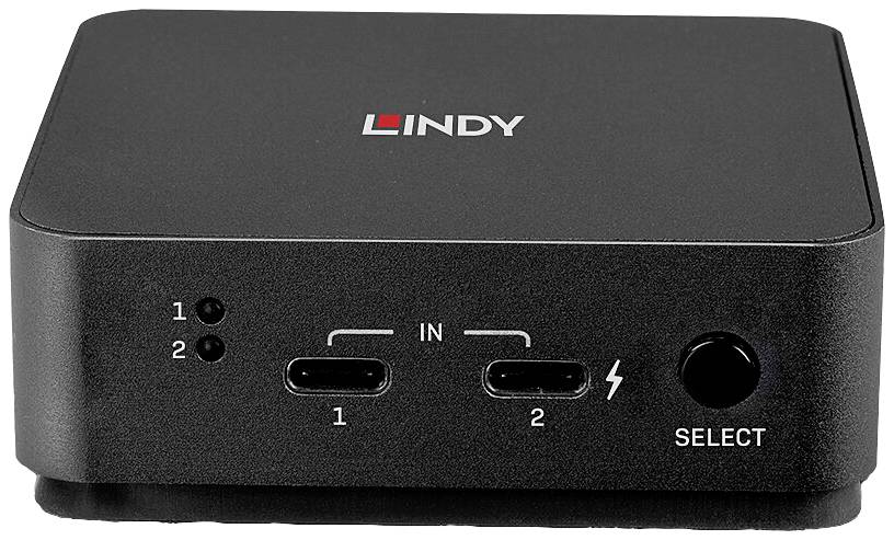 Černý USB-C KVM přepínač s nápisem 'LINDY', dvěma USB-C vstupy a výběrovým tlačítkem na přední straně.