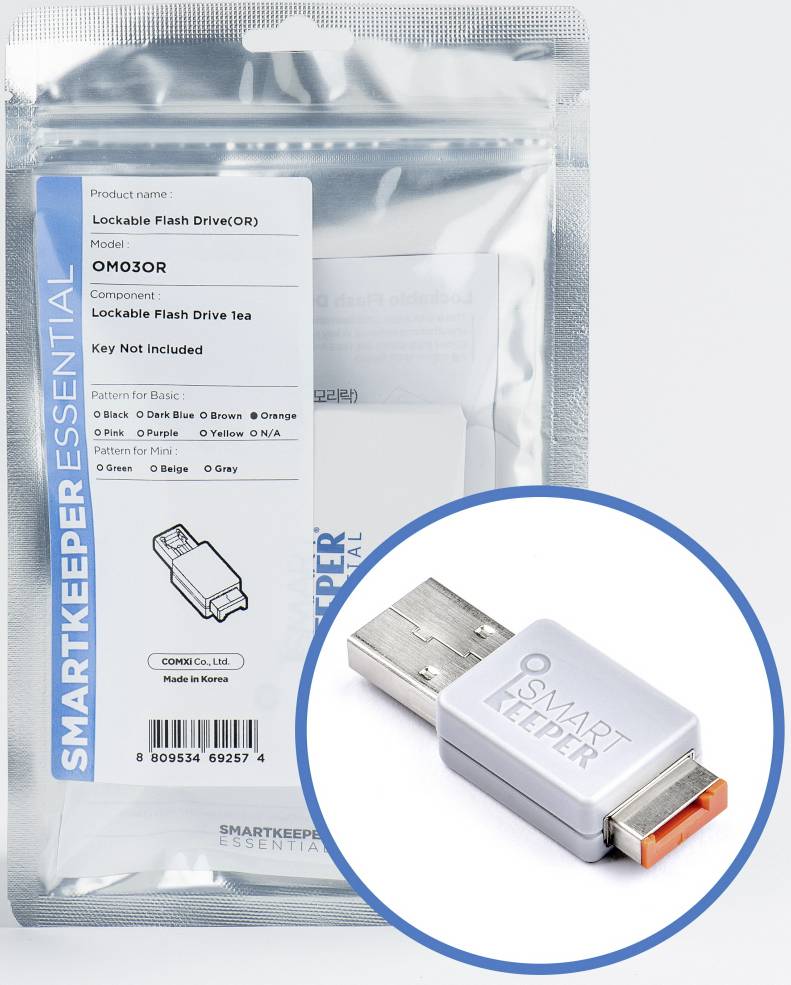USB bezpečnostní zařízení se zámkem a klíčem v zapečetěném sáčku, produktový název 'Lockable Flash Drive(OR)' pro zabezpečení dat.