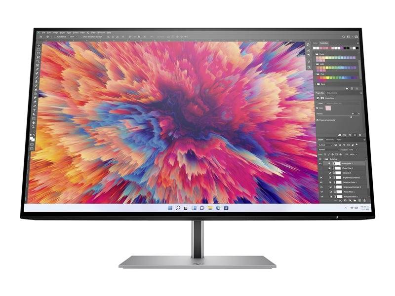 Počítačový monitor zobrazuje digitální umělecké dílo s barevnými, vírovými obrazci. Je otevřený software pro úpravu obrázků.