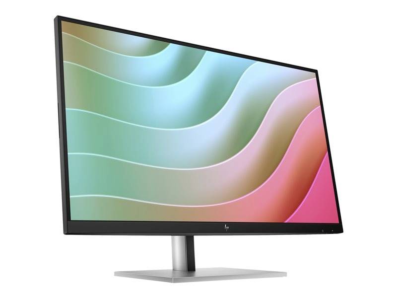 Počítačový monitor s grafickým pozadím tvořeným vlnitými barevnými přechody sahajícími od modrozelené po růžovou.