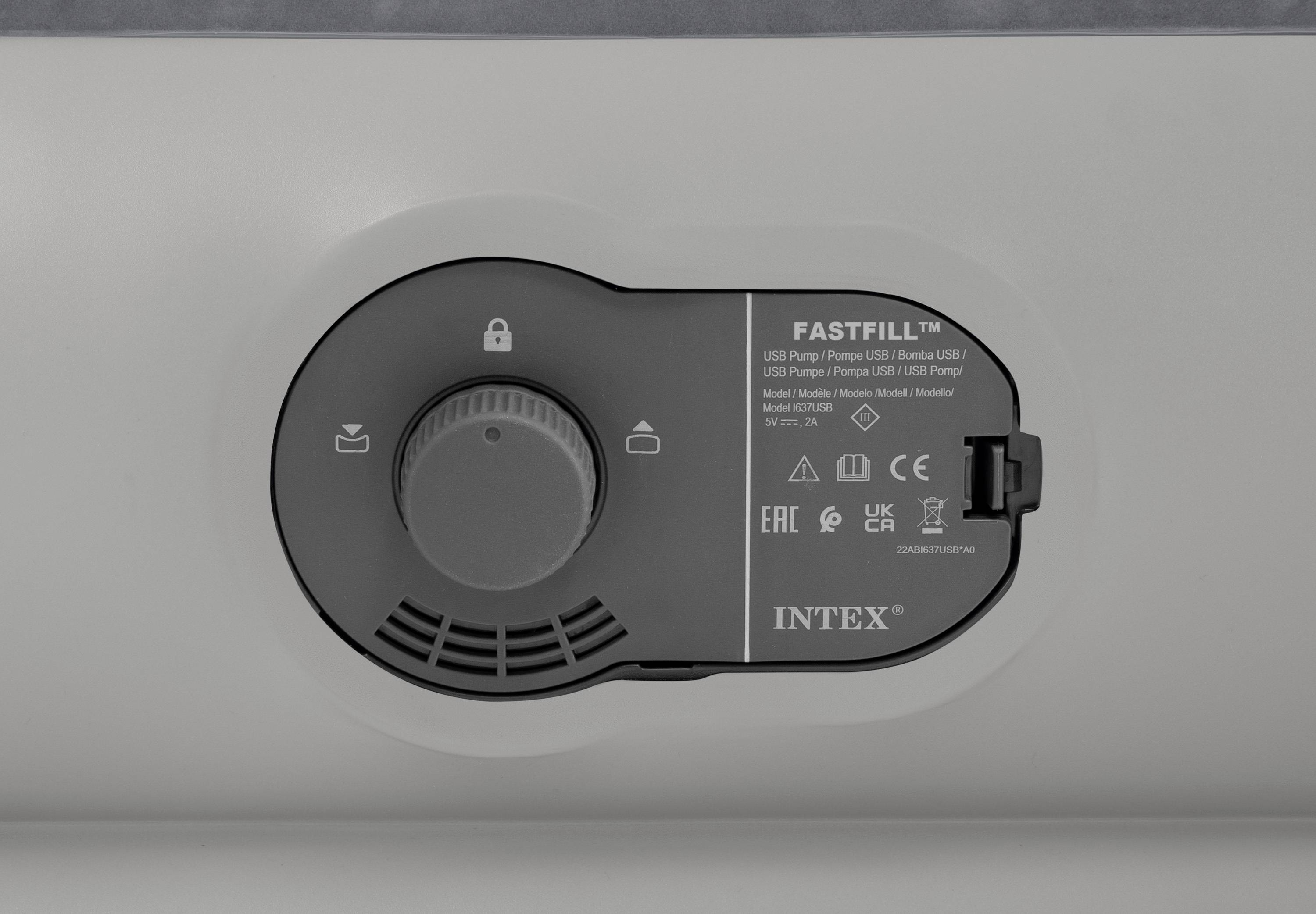 Detailní záběr šedého otočného přepínače s logem "FASTFILL™" a různými symboly, včetně zámku a kbelíku.