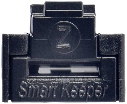 Černý plastový předmět s nápisem 'Smart Keeper' a symbolem Z nahoře.