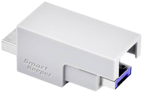 Plastová krytka USB portu, šedá, s nápisem 'Smart Keeper', chrání USB konektor před prachem a poškozením.