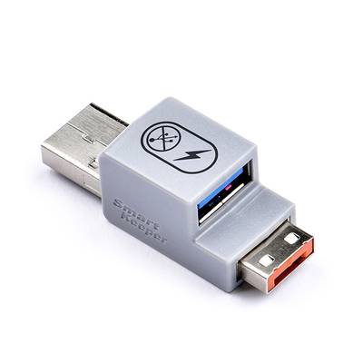 Bezpečnostní blokátor USB-A portů 'Smart Keeper' se symbolem zabezpečení, který zabraňuje neoprávněnému přístupu k USB portům.