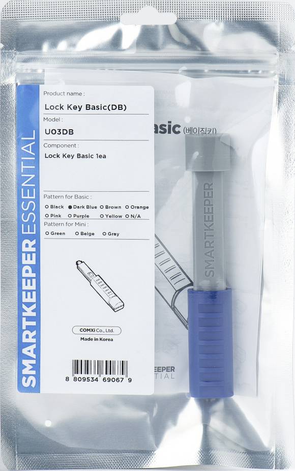 Zámkový klíč 'SmartKeeper Essential' Basic (DB) v stříbrném obalu s údaji o produktu a čárovým kódem. Vyrobeno v Koreji.