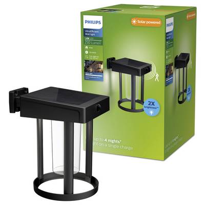 Černé solárně poháněné Philips UltraEfficient nástěnné světlo zobrazené vedle jeho zelené prodejní krabice s textem '2X jas' a 'až 4 noci' na jednu nabití.