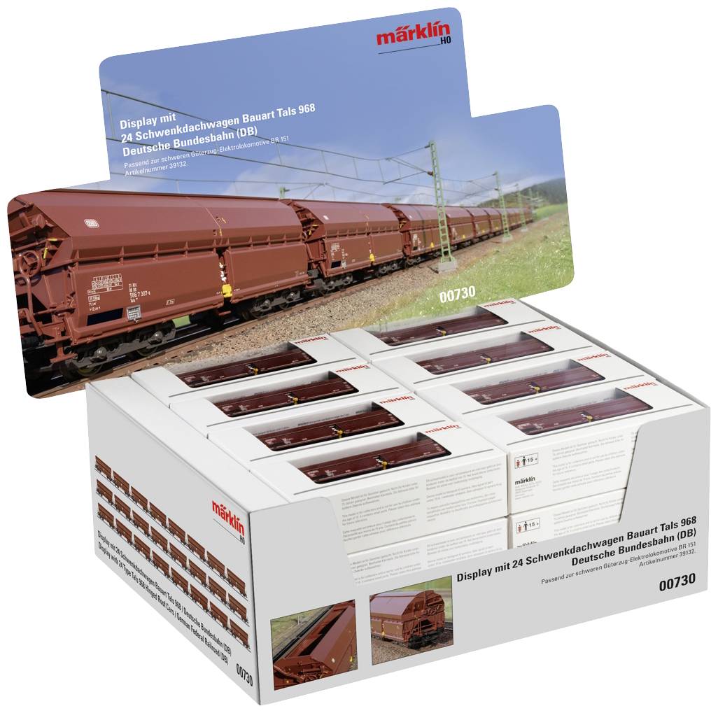 Displej s 24 otočnými střešními vozy série Taes 998 Deutsche Bundesbahn (DB) od Märklinu, zobrazující modelové železniční vozy v originálním balení.