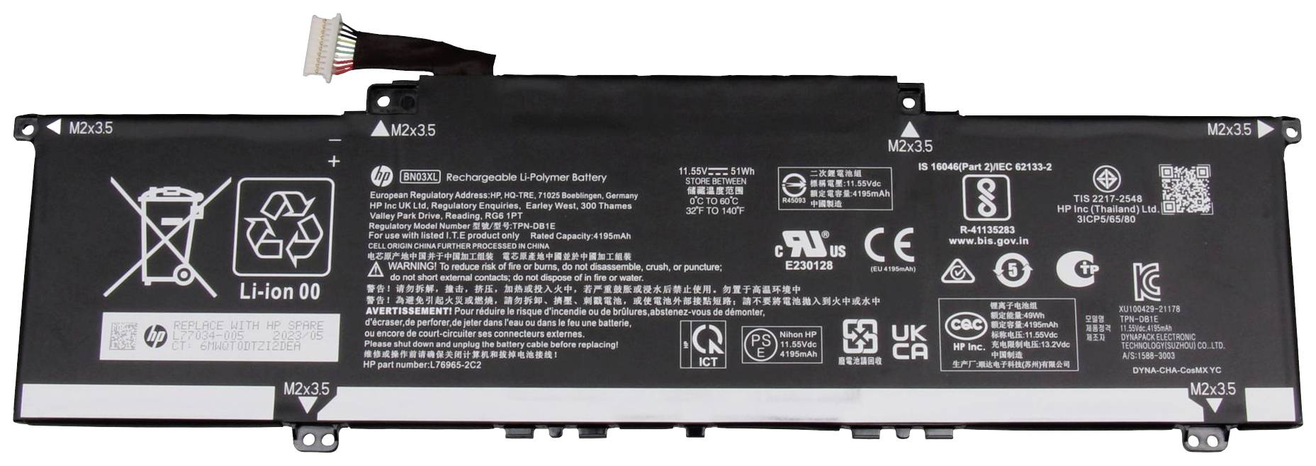Lithium-iontový akumulátor '00' pro notebook s bezpečnostními a recyklačními informacemi na černém pouzdře. Číslo modelu: 'MX215'.