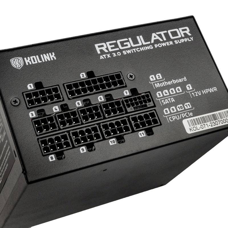 Napájecí zdroj Kolink ATX 3.0 Switching zobrazuje konektory pro základní desku, SATA, CPU/PCIe s 12V HPWR. Viditelných je 11 portů.