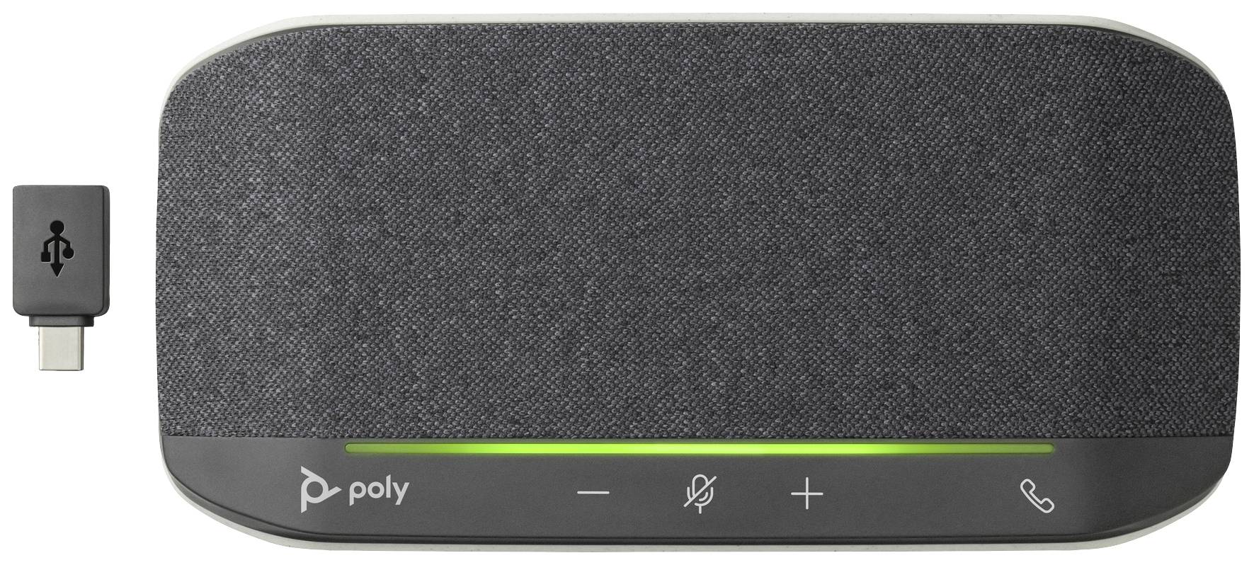Šedý reproduktor s USB adaptérem. Na přední straně se nacházejí tlačítka pro ovládání hlasitosti, ztlumení mikrofonu a ovládání hovoru.