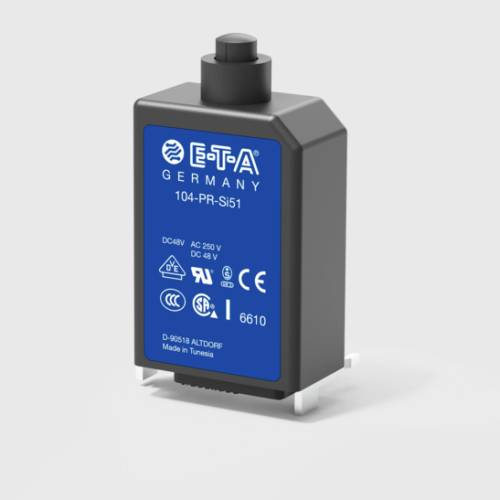 Černá elektrická součástka s modrým popisem, vyrobená v Německu. Zobrazuje různé technické symboly a specifikace.