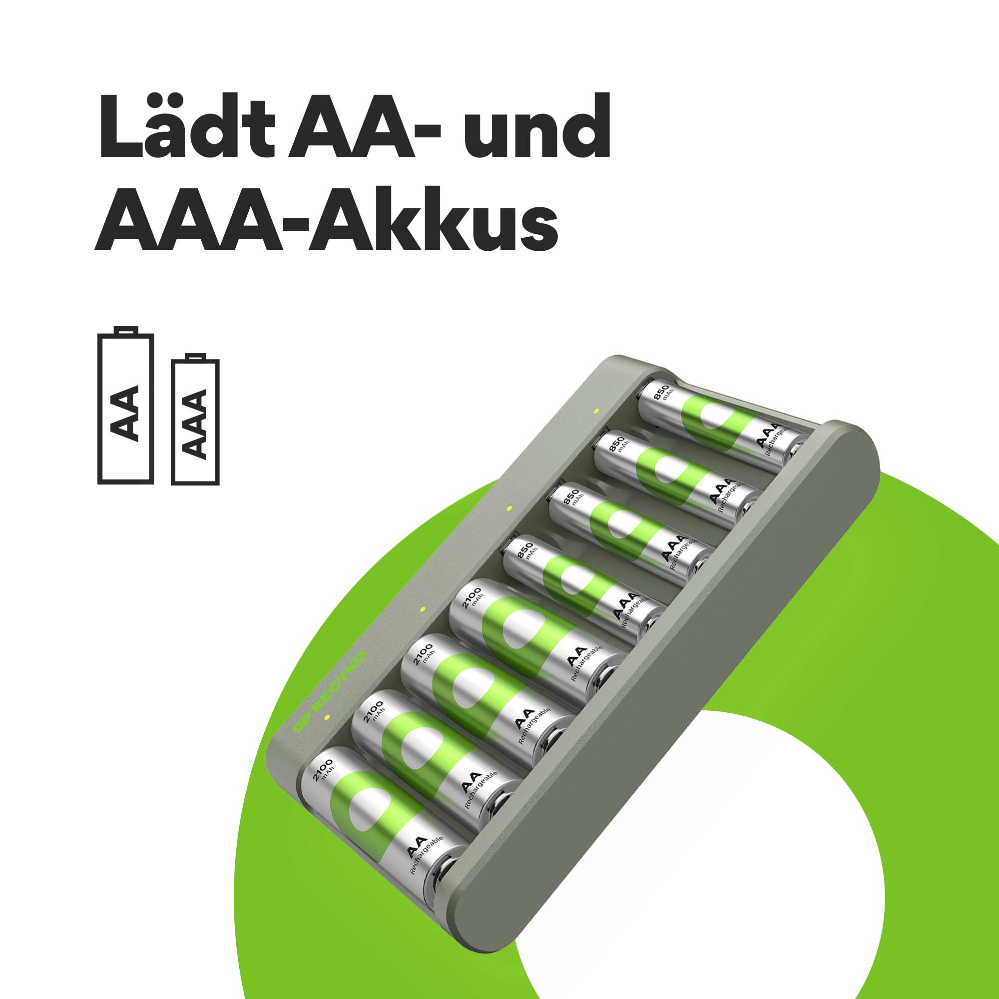 Nabíječka baterií pro AA a AAA baterie před zeleným pozadím. Text: 'Nabíjí AA a AAA baterie'.