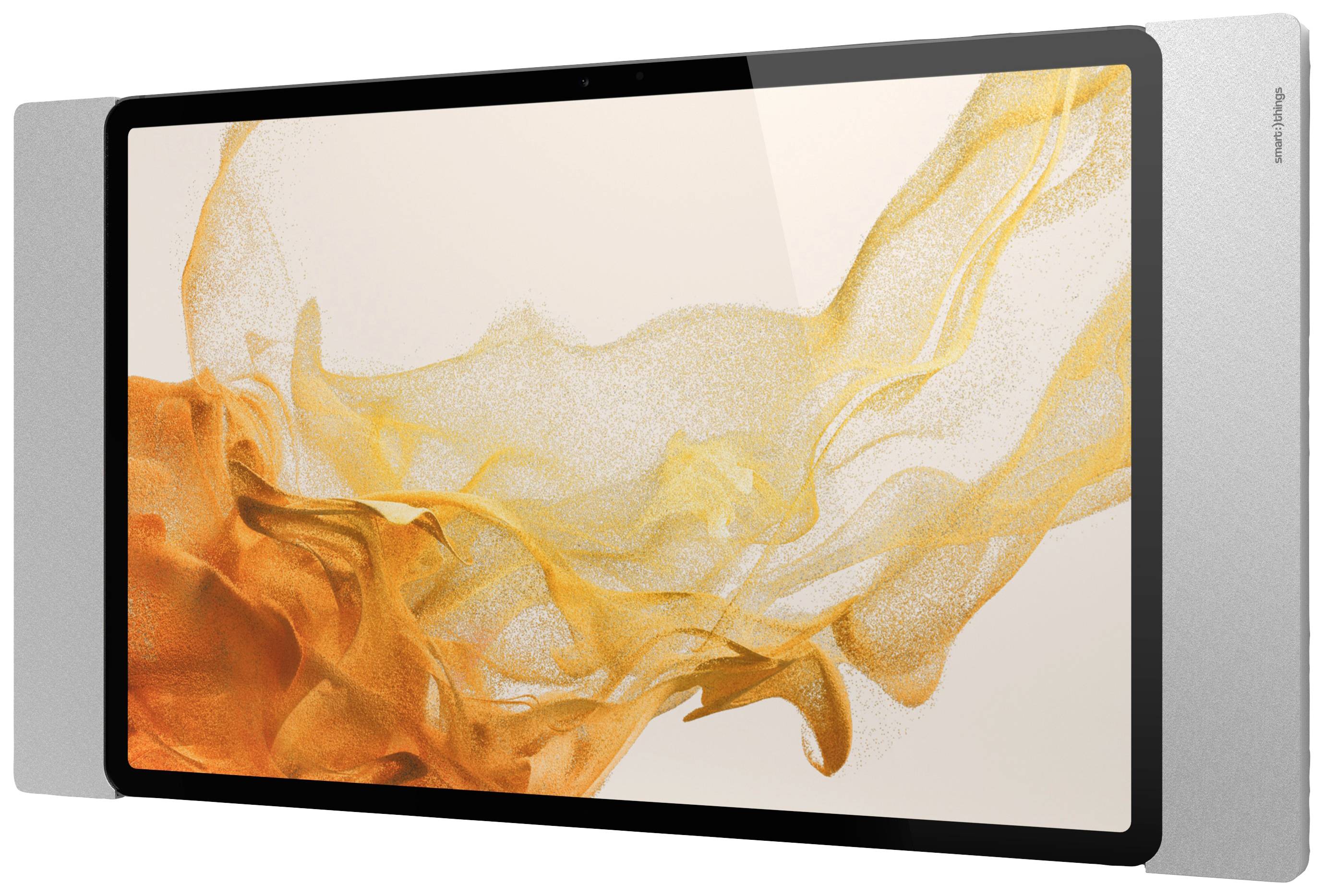 Moderní tablet s velkým displejem zobrazuje abstraktní obraz v odstínech oranžové a žluté. Design působí plynule a umělecky.