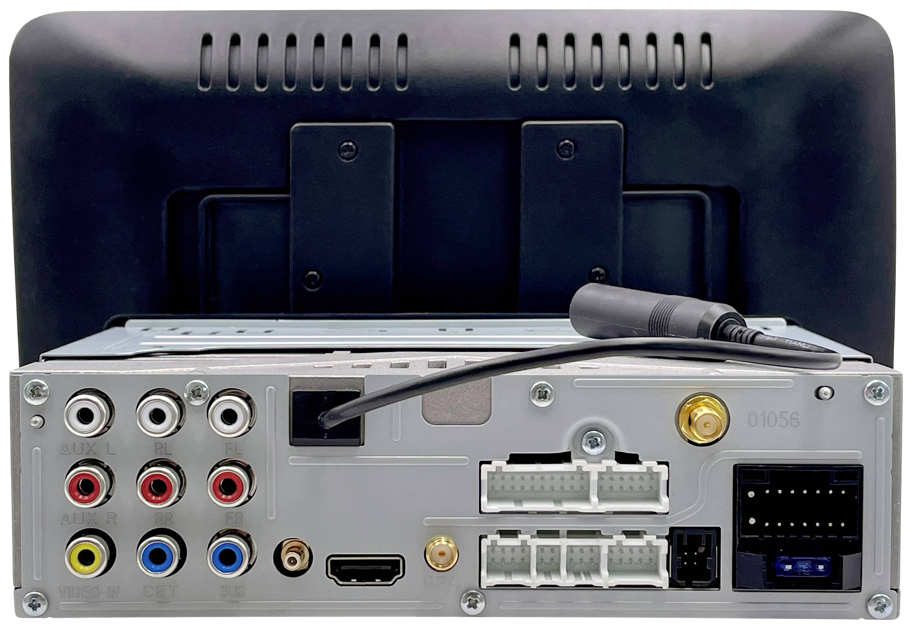 Zadní strana elektronického zařízení s několika audio a video konektory a kabelovými přípojkami, včetně HDMI portu a vstupu pro anténu.