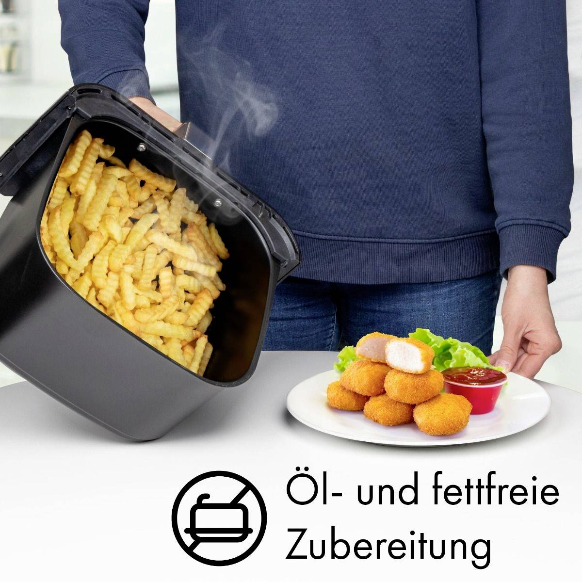 Osoba drží talíř s obalenými pochoutkami vedle horké fritézy s parující se fritovanou zeleninou. Text: 'Příprava bez oleje a tuku'.