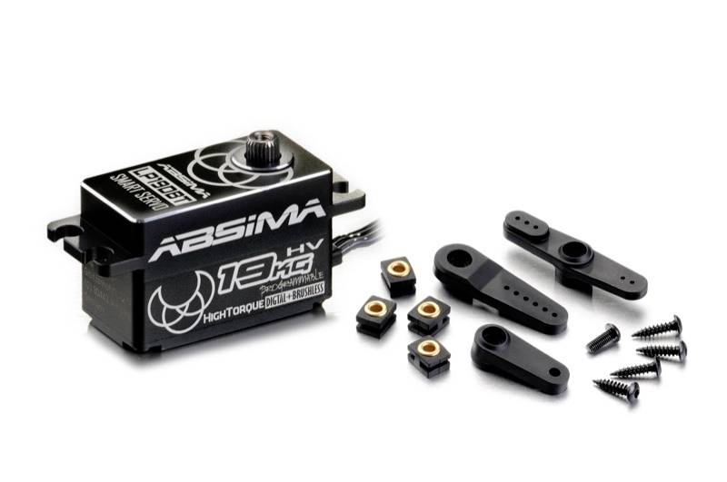 Servo-motor od Abismy s příslušenstvím, včetně páky a šroubů, na bílém pozadí. Vhodné pro RC modely.