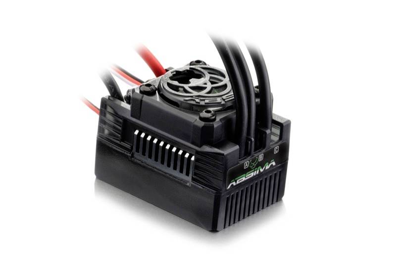 Elektronický regulátor jízdy s chladicími žebry a několika kabelovými přípoji, vhodný pro dálkově ovládaná modelová vozidla.