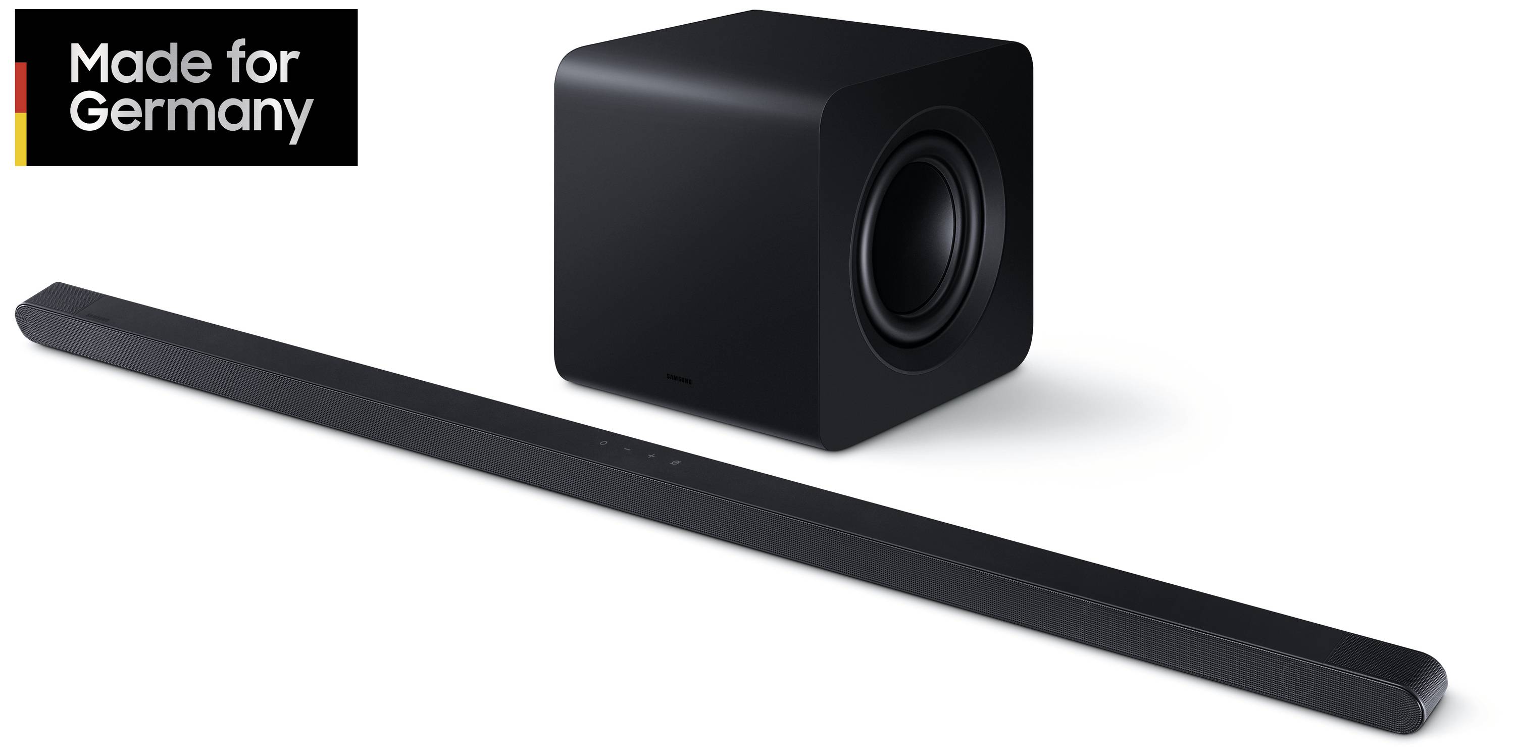 Černý soundbar a subwoofer s minimalistickým designem. Vlevo nahoře logo 'Made for Germany'.