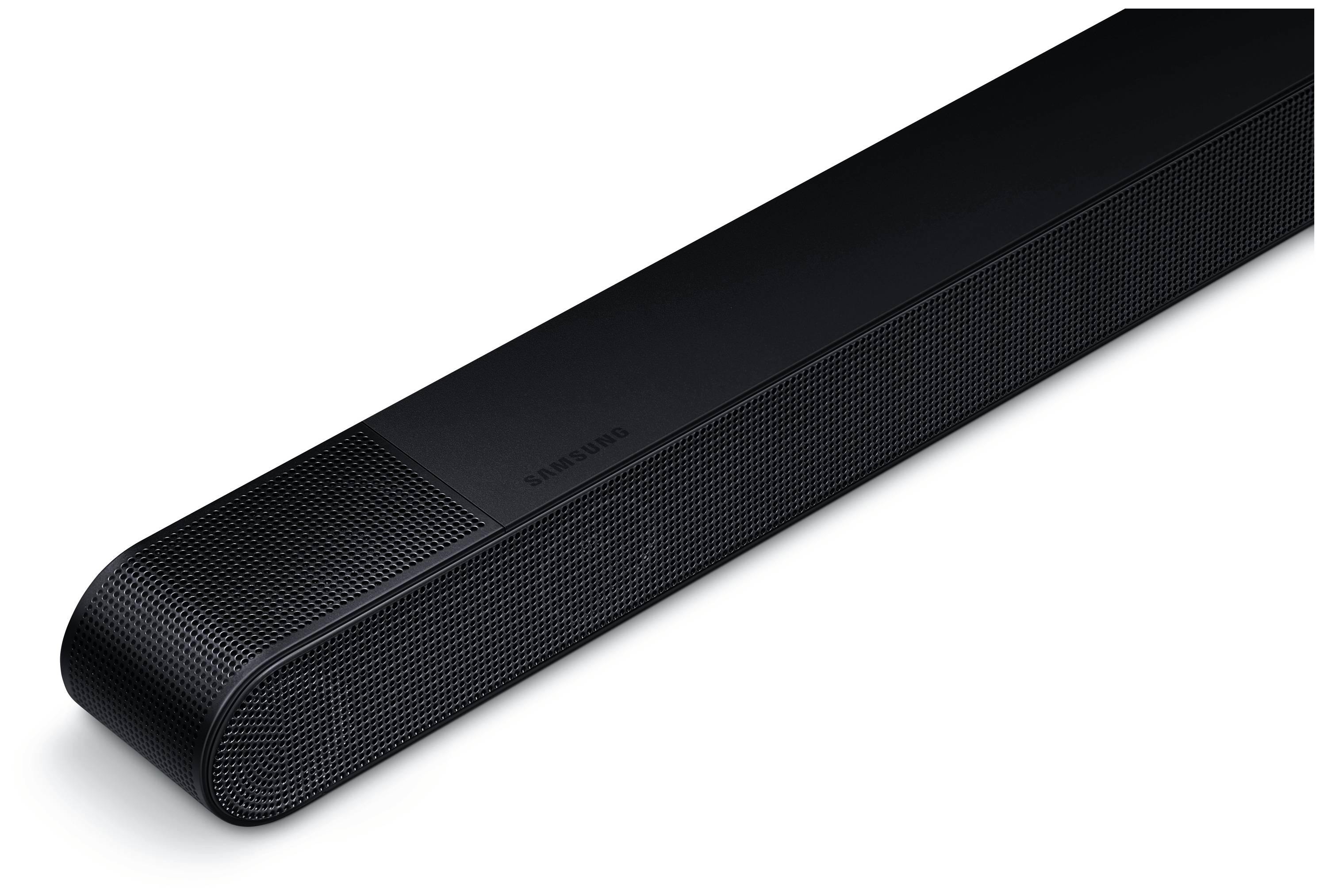 Černý soundbar se zaoblenými rohy a jemnou mřížkovou strukturou, který spojuje moderní design a vysoce kvalitní audiotechniku.