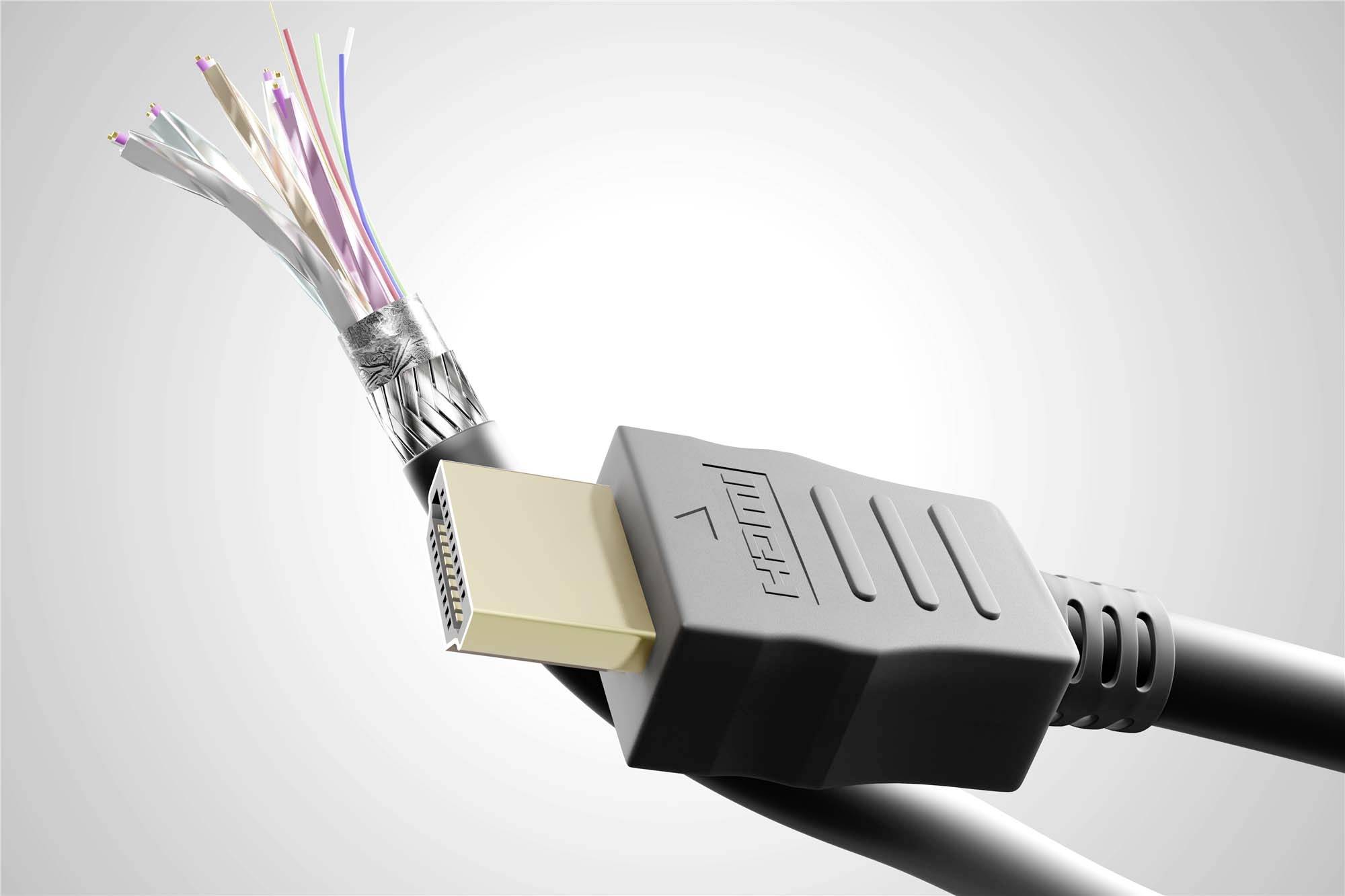 HDMI kabel s odhaleným vedením na jednom konci, který ukazuje vnitřní strukturu; druhý konec zakončen typickou HDMI zástrčkou.