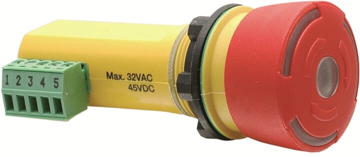 Červený, kulatý nouzový vypínač se žlutým krytem a zelenou připojovací lištou. Označený textem "Max. 32VAC 45VDC".
