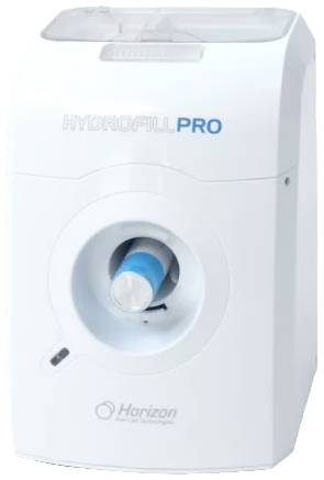 Bílý kryt zařízení s nápisem 'HYDROFILL PRO' na přední straně, pod ním kulatý prostor s viditelnou modrou spirálou.