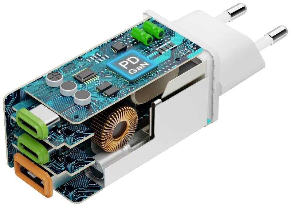 Otevřený síťový adaptér odhaluje vnitřní elektroniku, včetně měděného transformátoru, elektronických obvodů a USB portů.