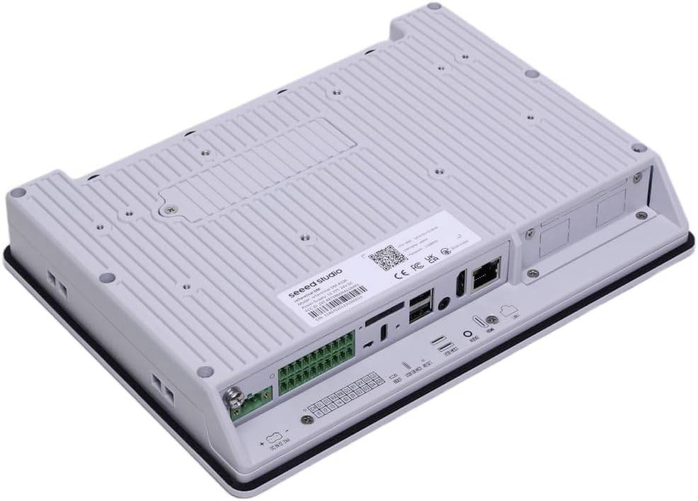 Obdélníkové elektronické zařízení s různými konektory a zeleným připojovacím blokem, vhodné pro průmyslové aplikace.