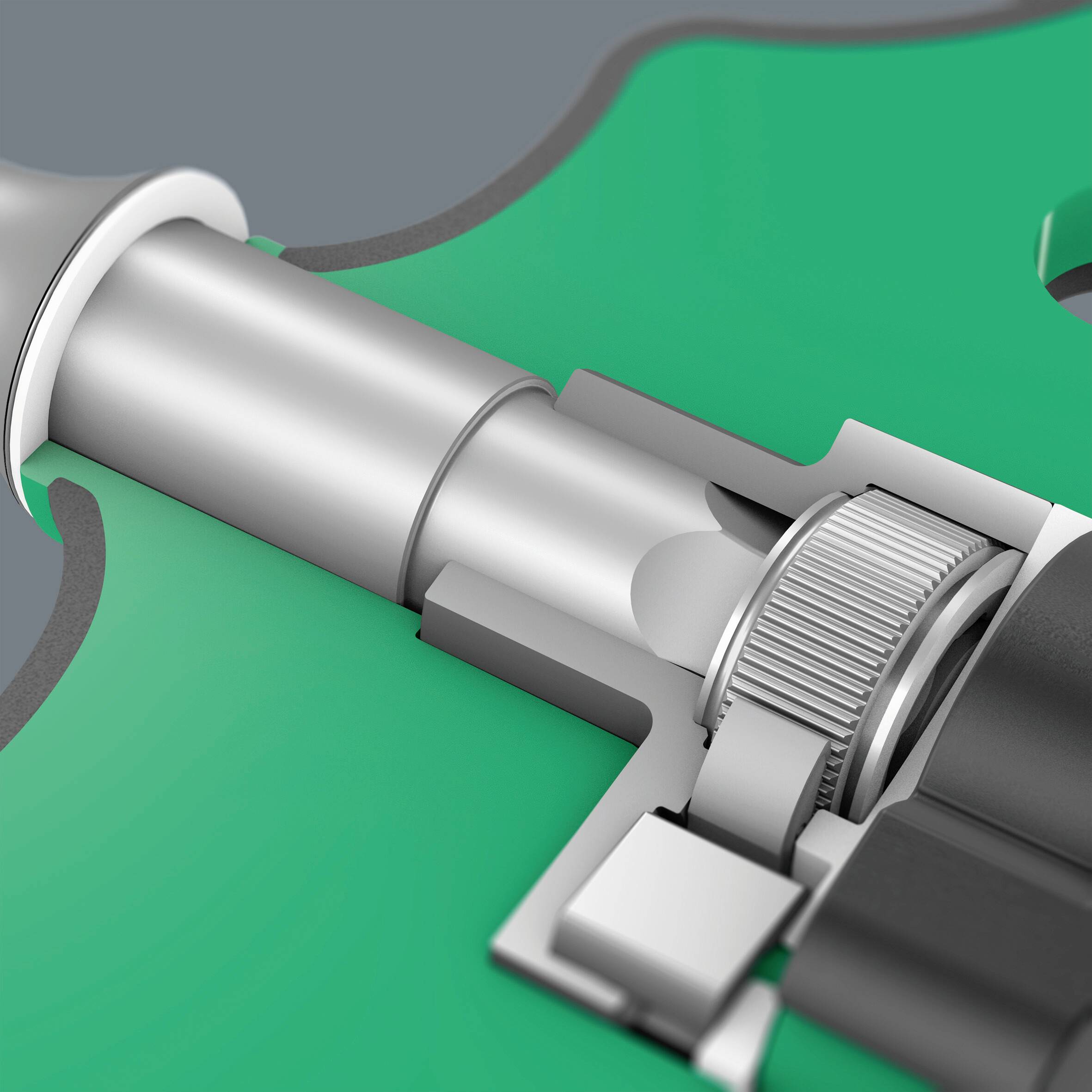 Příčný řez mechanickým zařízením s ozubenými koly, která do sebe zapadají. Jsou viditelné konstruktérské technické detaily.