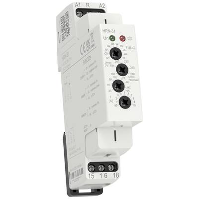 Bílé elektronické zařízení pro monitorování napětí. Má vstupní a výstupní konektory a různé ovládací prvky.