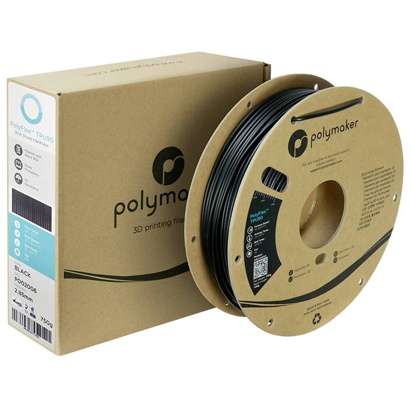 3D tiskové vlákno v černé barvě od Polymakeru, na cívce s obalem v pozadí. Specifikace materiálu: plast o průměru 2,85 mm.