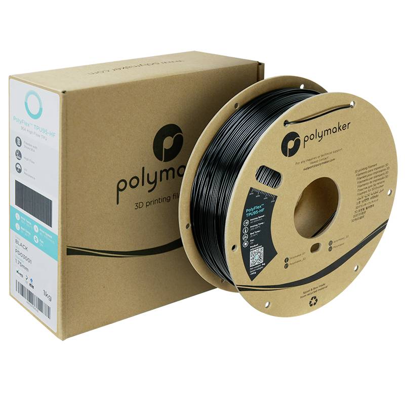 Hnědá plastová cívka s černým 3D tiskovým materiálem značky Polymaker stojí vedle odpovídající krabičky.