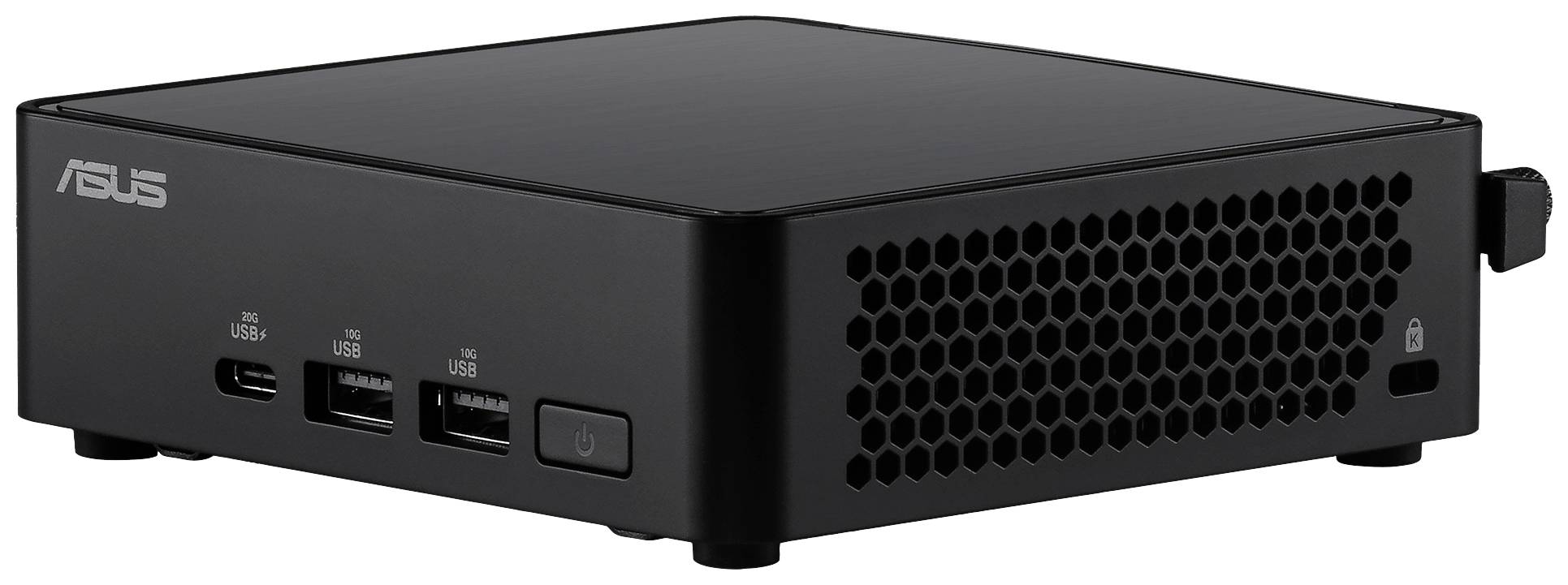 Černý, kompaktní mini počítač s několika USB porty na přední straně. Kryt zařízení má honeycombový (včelí plástev) vzor pro větrání.