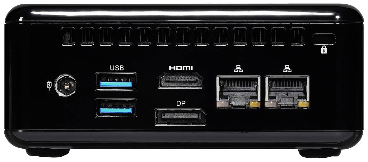 Kompaktní černý počítač s přípojkami: 2x USB, HDMI, DisplayPort a 2x Ethernet. Větrací štěrbiny nahoře.