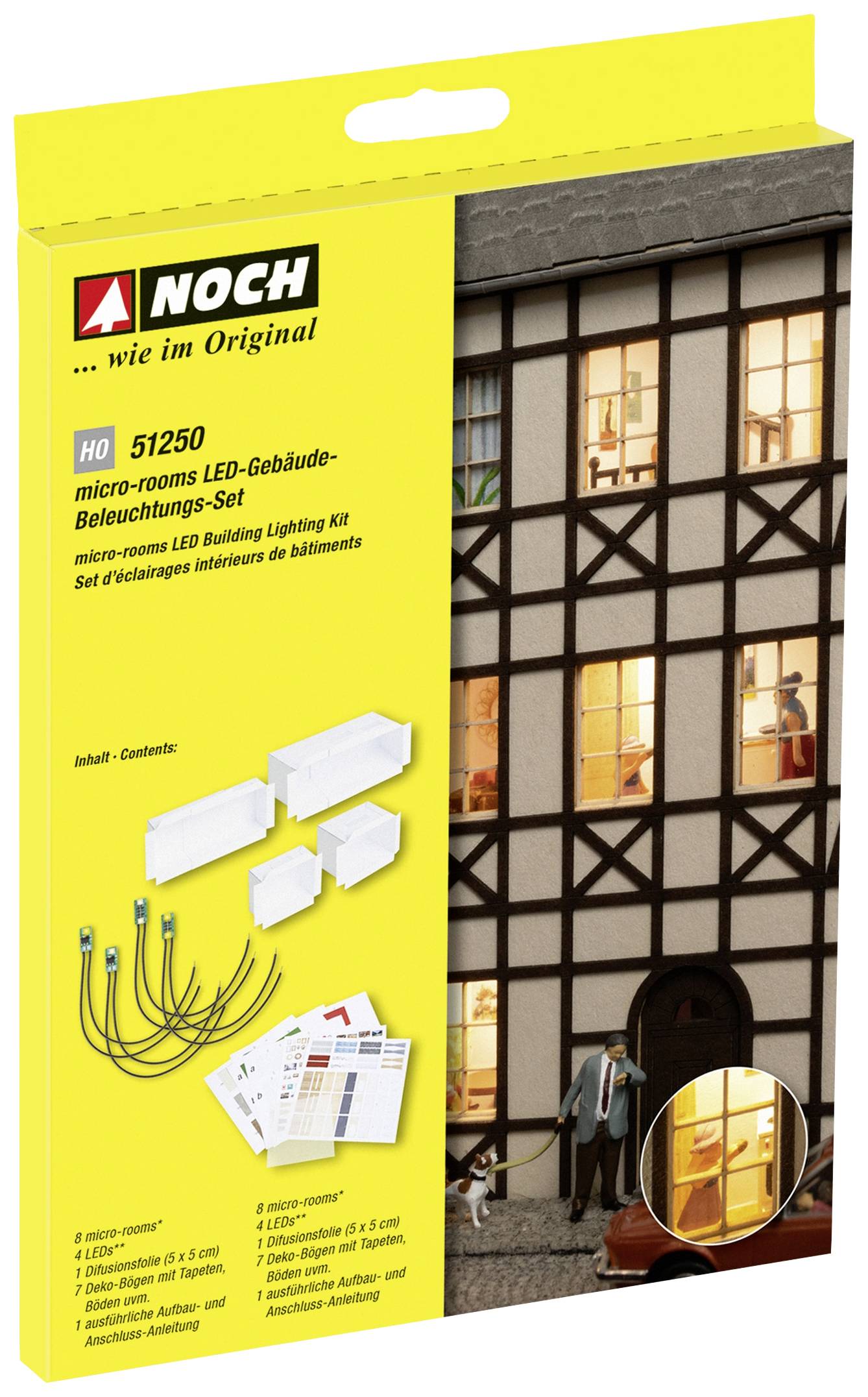 Stavebnice osvětlení budov s LED. Obsahuje LED diody, kabely a návod. Zobrazuje osvětlený modelový dům.
