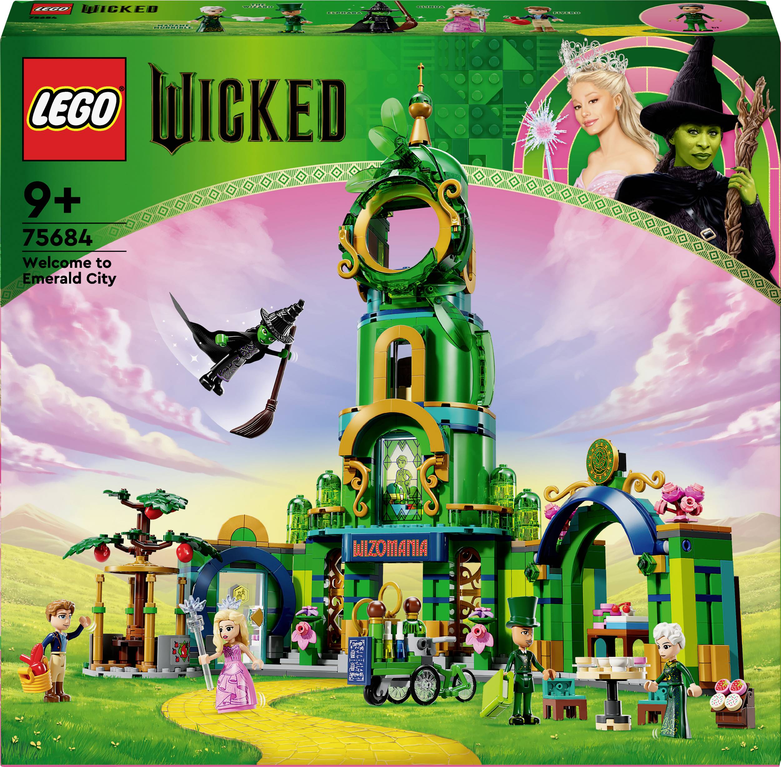 LEGO sada od 9 let, inspirovaná muzikálem 'Wicked'. Barevná stavba a figurky v zelené krajině s růžovým nebem.