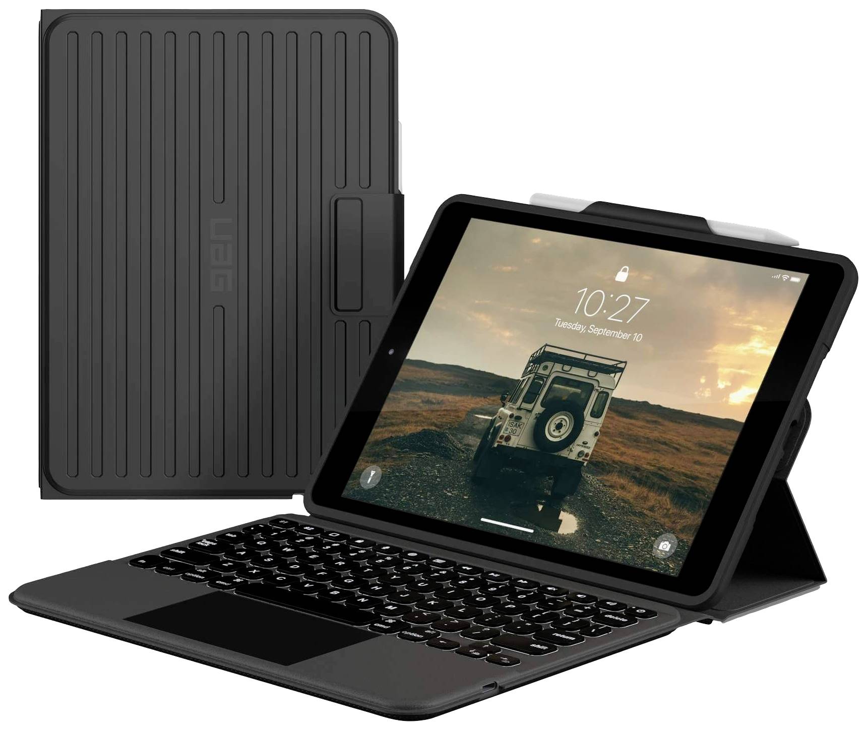 Tablet s krytem klávesnice, displej zobrazuje vozidlo v krajině, datum: úterý, 19. září, čas: 10:27, klávesnice je používána.