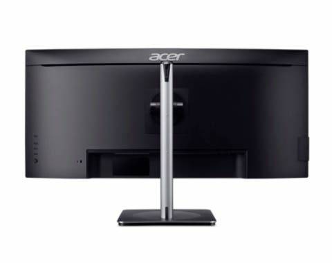 Pohled zezadu na černý zakřivený monitor Acer s elegantním stojanem, vhodný pro moderní designové pracoviště.