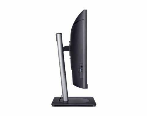 Boční pohled na černý počítačový monitor umístěný na obdélníkovém podstavci, který ukazuje štíhlý a moderní design displeje.