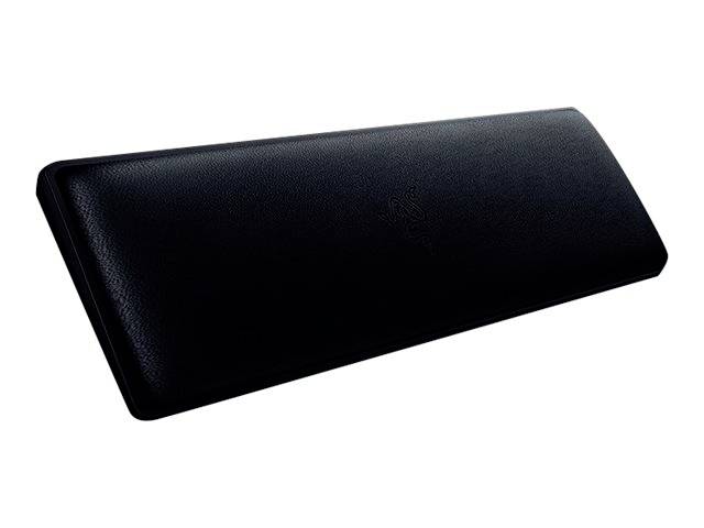 Černá ergonomická opěrka zápěstí z kůže, obdélníkového tvaru a lehce polstrovaná, určená k podpoře při práci s klávesnicemi.